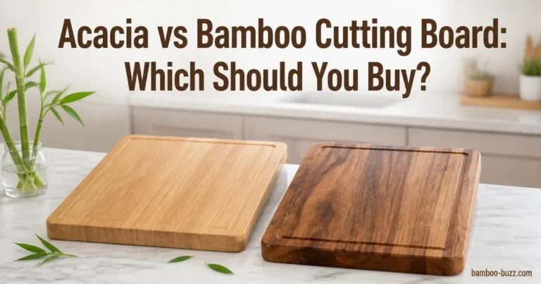 Side-by-side acacia and bamboo cutting boards on marble counter with bamboo stalk and leaves nearby