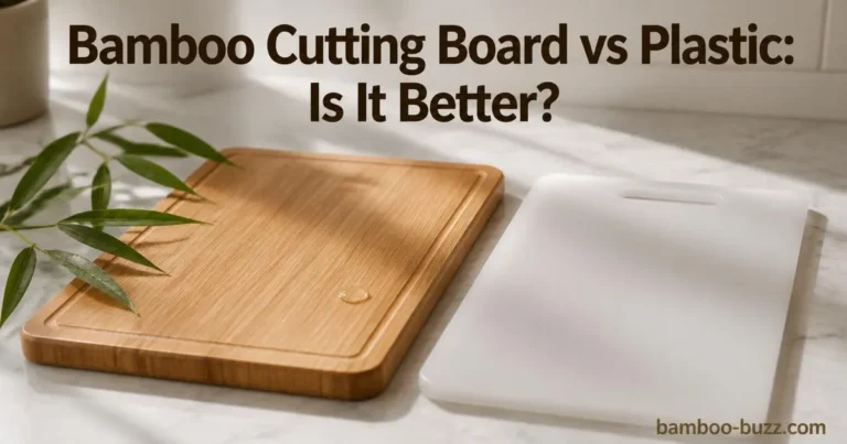Bamboo cutting board with natural grain and bamboo leaves next to a smooth plastic cutting board on marble counter